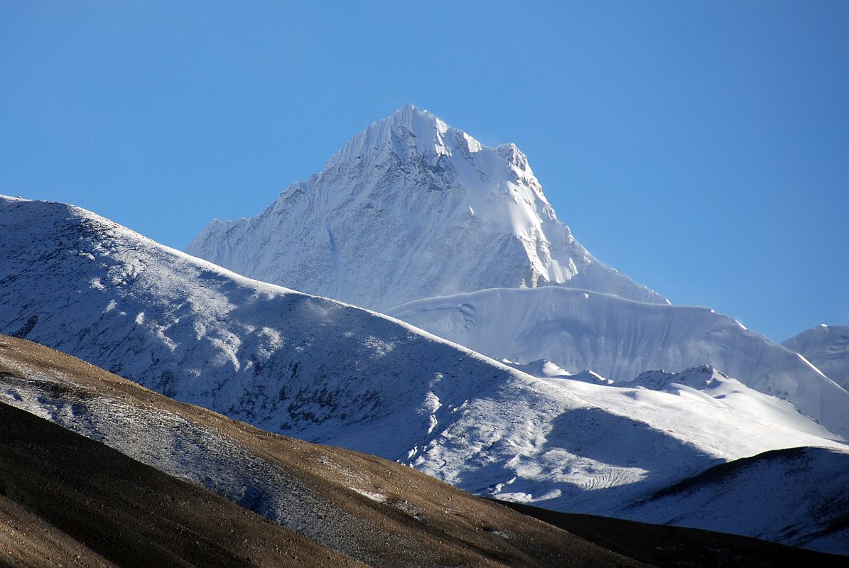 04 Nangpai Gosum I, Pasang Lhamu Chuli, Cho Aui From Cho Oyu Chinese Base Camp Nangpai Gosum I (7351m, also called Cho Aui or Pasang Lhamu Chuli, lies on the ridge to the east of Cho Oyu. Nangpai Gisum I was first climbed by a Japanese expedition starting from Tibet via the northwest ridge with Katsushi Emura, Yukitoshi Endo, Katsuo Matsuki and Yoshihiro Shikoda reaching the summit on October 12, 1986, followed by six more expedition members two days later.